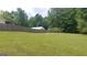 Large backyard with fenced area and storage shed at 2477 Briar Valley Way, Dacula, GA 30019