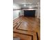 Basement bar with dark counter and hardwood floor at 2477 Briar Valley Way, Dacula, GA 30019