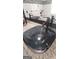 Bathroom featuring a dark glass vessel sink and modern faucet at 2477 Briar Valley Way, Dacula, GA 30019