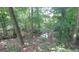 Wooded creekside property offering a serene natural setting at 2477 Briar Valley Way, Dacula, GA 30019