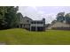 Two-story house with screened porch and yard at 2477 Briar Valley Way, Dacula, GA 30019