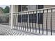 Black metal porch railing with curved accents at 2477 Briar Valley Way, Dacula, GA 30019