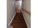 Elegant wooden staircase leading to a beautiful hardwood floor at 2477 Briar Valley Way, Dacula, GA 30019