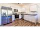 Modern kitchen featuring stainless steel appliances and white cabinets at 177 Swindon Dr, Mcdonough, GA 30253