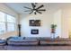 Bright living room featuring a large TV and electric fireplace at 177 Swindon Dr, Mcdonough, GA 30253