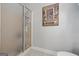 Clean bathroom with a shower and linen storage at 730 N Bethany Rd, Mcdonough, GA 30252