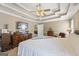 Large bedroom with a king-size bed and built-in dresser at 730 N Bethany Rd, Mcdonough, GA 30252