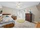 Cozy bedroom with a twin-size bed and plenty of closet space at 730 N Bethany Rd, Mcdonough, GA 30252