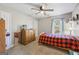 Bright bedroom with wood flooring, a twin bed, and ample closet space at 730 N Bethany Rd, Mcdonough, GA 30252