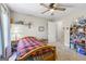 Charming bedroom with a twin bed, built-in shelving, and natural light at 730 N Bethany Rd, Mcdonough, GA 30252