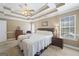 Bright bedroom featuring a king-size bed and ample natural light at 730 N Bethany Rd, Mcdonough, GA 30252