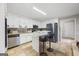 Well-equipped kitchen with stainless steel appliances and breakfast bar at 730 N Bethany Rd, Mcdonough, GA 30252