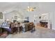 Open living and dining room with hardwood floors at 730 N Bethany Rd, Mcdonough, GA 30252