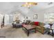 Living room with a large TV and comfortable seating at 730 N Bethany Rd, Mcdonough, GA 30252