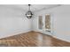 Dining area with hardwood floors and French doors at 135 Kimbell Farm Dr, Locust Grove, GA 30248