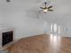 Living room with fireplace and hardwood floors at 135 Kimbell Farm Dr, Locust Grove, GA 30248