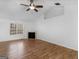 Living room with hardwood floors and corner fireplace at 135 Kimbell Farm Dr, Locust Grove, GA 30248