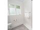 Clean bathroom with a toilet and shower at 107 Rolling Green, Peachtree City, GA 30269