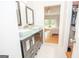 Double vanity bathroom with modern fixtures at 107 Rolling Green, Peachtree City, GA 30269