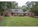 Brick house exterior with large front yard at 107 Rolling Green, Peachtree City, GA 30269