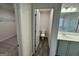 This bathroom has a double sink vanity, tub/shower, separate toilet room, and walk-in closet at 2791 Riverchess Ct # 147, Atlanta, GA 30331