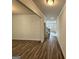 Entryway featuring wood flooring and view of the stairwell and living area at 2791 Riverchess Ct # 147, Atlanta, GA 30331