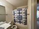 Clean bathroom with a shower/tub combo and blue shower curtain at 190 Wynfield Dr, Covington, GA 30016