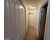 A hallway with carpet and doors leading to other rooms at 190 Wynfield Dr, Covington, GA 30016