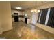 Eat-in kitchen with black appliances and tile floor at 190 Wynfield Dr, Covington, GA 30016