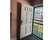 A light entryway with a security door offers a view of the neighborhood outside at 1344 Lynford Sw Dr, Atlanta, GA 30310