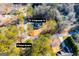 House and property shown from above with wooded surroundings at 16 Edgewater Dr, Temple, GA 30179