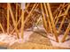 Unfinished attic space with exposed beams and insulation at 16 Edgewater Dr, Temple, GA 30179