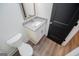 Small bathroom with granite vanity and dark door at 16 Edgewater Dr, Temple, GA 30179