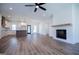 Open living space with kitchen, fireplace and hardwood floors at 16 Edgewater Dr, Temple, GA 30179