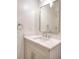 Simple bathroom with a single vanity, quartz countertop, and a framed mirror at 1947 Clark Dr, Tucker, GA 30084