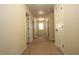 Long hallway with carpeted floors and multiple doors leading to bedrooms at 316 Trulove Lane Lot 35 # 35, Locust Grove, GA 30248