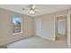 Spacious bedroom with a closet and window at 155 Woodgate Cir, Fayetteville, GA 30215