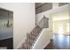 Elegant staircase with wrought iron railings leading to the second floor at 5635 Laney Dr # Ln34, Rex, GA 30273