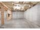 Unfinished basement features open layout with exposed beams and concrete floor, offering versatile potential at 418 Branch Forest Way, Stockbridge, GA 30281