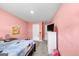 Bright bedroom with double bed and built-in closet at 11945 Lovejoy Crossing Way, Hampton, GA 30228
