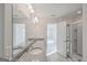 Double vanity bathroom with granite countertop and separate shower at 303 Roundwood Way, Peachtree City, GA 30269