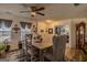 Dining room with a wooden table and gray upholstered chairs at 236 Augusta Walk, Canton, GA 30114