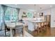 Bright kitchen features an island, dining area, and hardwood floors at 68 Peachtree Memorial - Nw Dr # 68, Atlanta, GA 30309