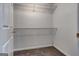 Large walk-in closet with wire shelving and carpet at 6191 Valley Green Rd, Lithonia, GA 30058