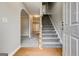 Staircase and hardwood floors in the foyer at 6191 Valley Green Rd, Lithonia, GA 30058