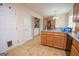 Bright kitchen with wood cabinets, an island, and a breakfast nook at 74 Canterbury Dr, Grantville, GA 30220