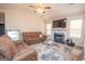 Spacious living room with a fireplace and neutral decor at 74 Canterbury Dr, Grantville, GA 30220