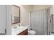 Small bathroom with shower/tub combo, toilet and vanity at 704 Kitts Ct, Mcdonough, GA 30253