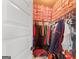 Large walk-in closet with ample hanging and shelving space at 704 Kitts Ct, Mcdonough, GA 30253