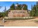 Annaberg community entrance with brick signage and landscaping at 704 Kitts Ct, Mcdonough, GA 30253